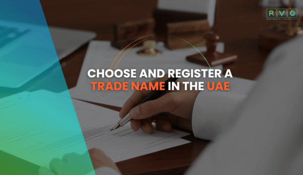 Business professional signing documents for UAE trade name registration.