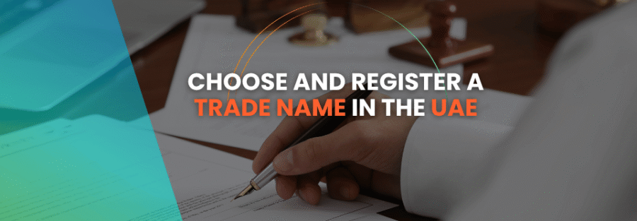 Business professional signing documents for UAE trade name registration.
